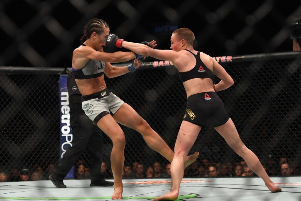 Apr 7, 2018; Brooklyn, NY, USA; Rose Namajunas (Red Gloves) fights Joanna Jedrzezjczyk (Blue gloves) during UFC 223 at Barclays Center. Mandatory Credit: Dennis Schneidler-USA TODAY Sports