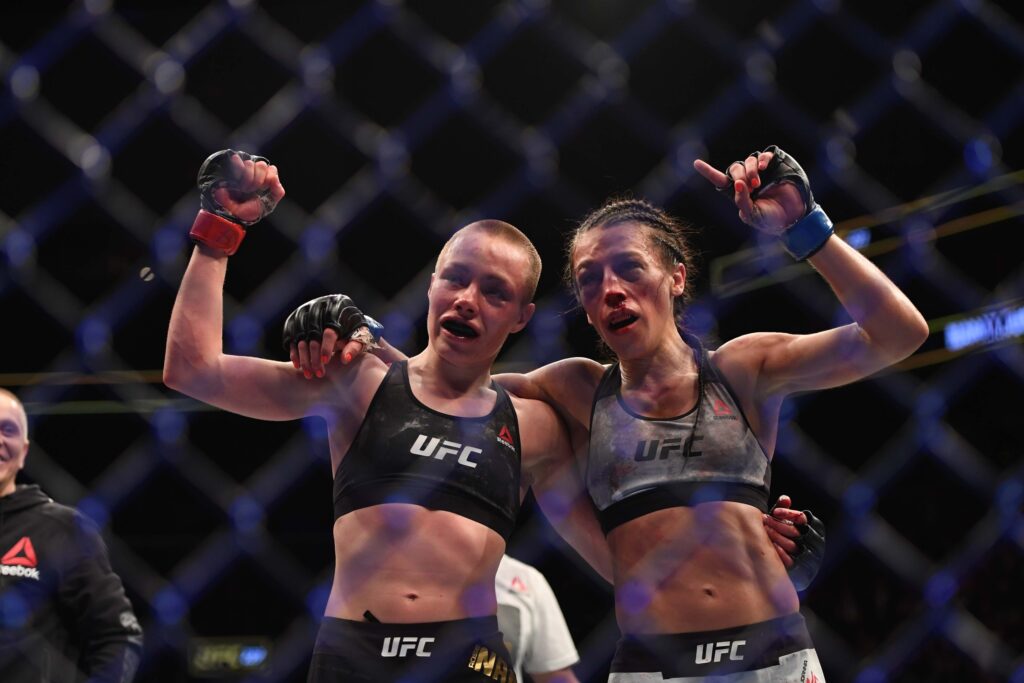 Apr 7, 2018; Brooklyn, NY, USA; Rose Namajunas (Red Gloves) and Joanna Jedrzezjczyk (Blue gloves) react to the fight during UFC 223 at Barclays Center. Mandatory Credit: Dennis Schneidler-USA TODAY Sports
