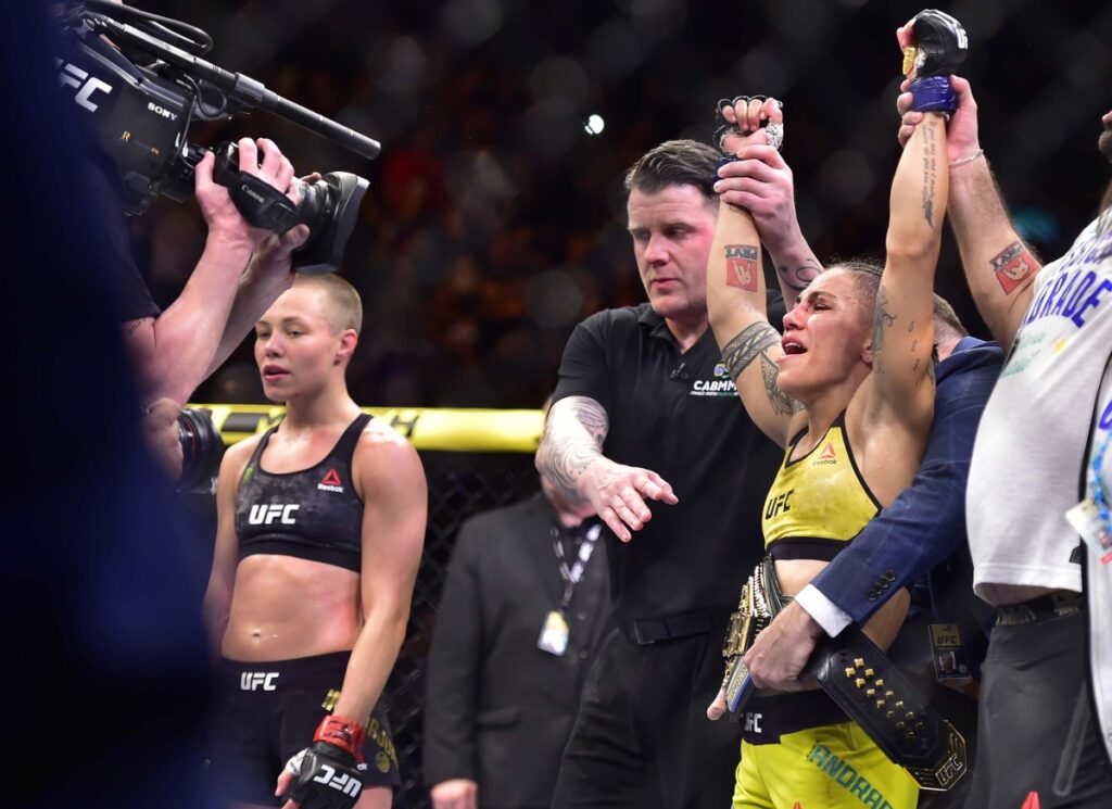 May 11, 2019; Rio de Janeiro, Brazil; Jessica Andrade (blue gloves) reacts to fight against Rose Namajunas (red gloves) during UFC 237 at Jeunesse Arena. Mandatory Credit: Jason Silva-USA TODAY Sports