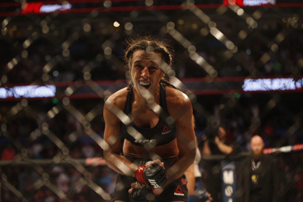 Oct 12, 2019; Tampa, FL, USA; Joanna Jedrzejczyk (red gloves) reacts against Michelle Waterson (not pictured) during UFC Fight Night at Amalie Arena. Mandatory Credit: Reinhold Matay-USA TODAY Sports