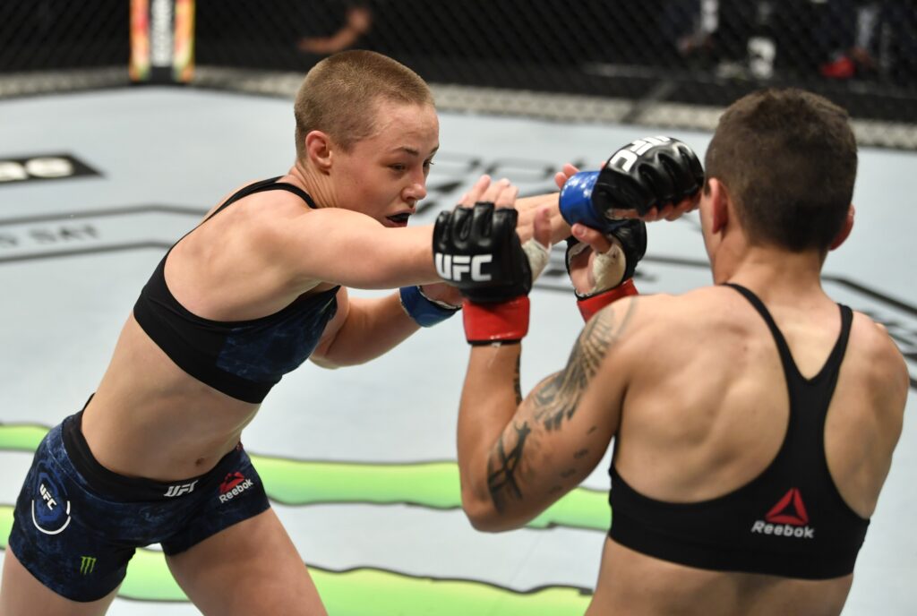 July 12, 2020; Abu Dhabi, UAE;  Rose Namajunas punches Jessica Andrade of Brazil in their strawweight fight during the UFC 251 event at Flash Forum on UFC Fight Island on July 12, 2020 on Yas Island, Abu Dhabi, United Arab Emirates. Mandatory Credit: Jeff Bottari/Zuffa LLC via USA TODAY Sports