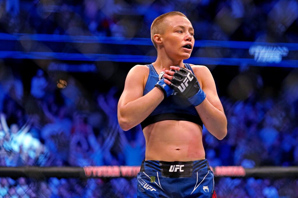 Apr 24, 2021; Jacksonville, Florida, USA; Rose Namajunas (Blue Gloves) reacts after defeating Zhang Weili (Red Gloves) during UFC 261 at VyStar Veterans Memorial Arena. Mandatory Credit: Jasen Vinlove-USA TODAY Sports
