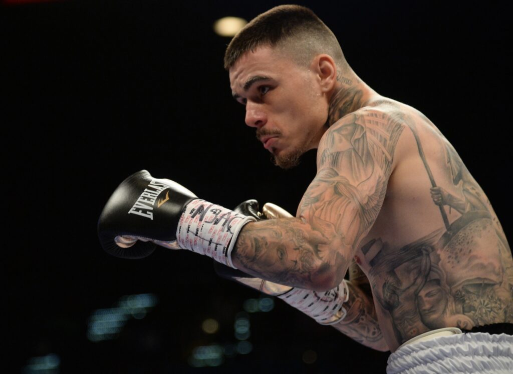 Jan 19, 2019; Las Vegas, NV, USA; George Kambosos Jr (white/black trunks) and Rey Perez (not pictured) box during a lightweight boxing match at MGM Grand Garden Arena. Kambosos Jr won via unanimous decision. Mandatory Credit: Joe Camporeale-USA TODAY Sports