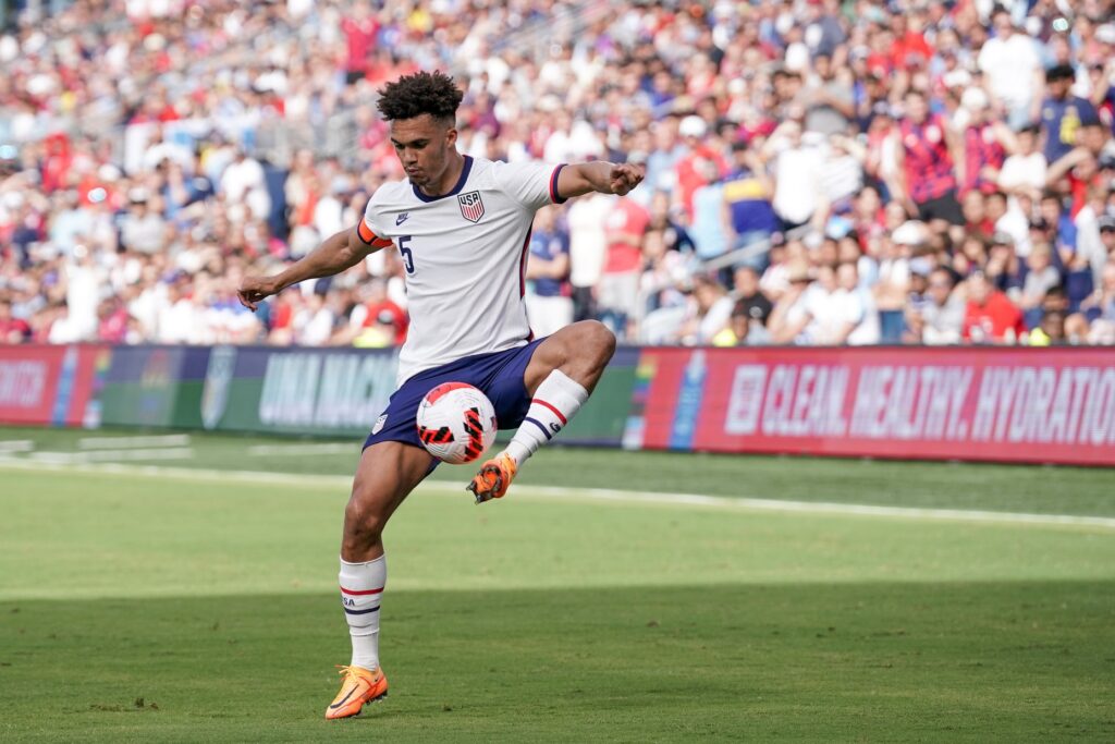 Jun 5, 2022; Kansas City, Kansas, USA; USA defender Antonee Robinson (5) controls the ball against Uruguay during an international friendly soccer match at Children's Mercy Park. Mandatory Credit: Denny Medley-USA TODAY Sports