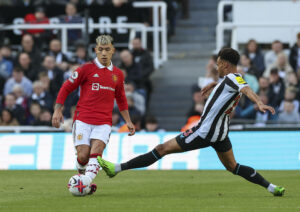 April 2, 2023, Newcastle, Newcastle, United Kingdom: 2nd April 2023 St James Park, Newcastle, England: Premier League Football, Newcastle United versus Manchester United, ManU Manchester United s Lisandro Martinez passes the ball under pressure from Newcastle United s Jacob Murphy Newcastle United Kingdom - ZUMAa193 20230402_zsa_a193_616 Copyright: xLeexParkerx