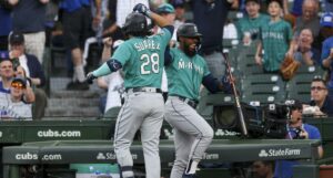 April 11, 2023: The Seattle Mariners Teoscar Hernandez 35 celebrates with teammate Eugenio Suarez 28 after he hit a two-run home run during the first inning against the Chicago Cubs at Wrigley Field on Tuesday, April 11, 2023, in Chicago. - ZUMAm67_ 0242663242st Copyright: xArmandoxL.xSanchezx