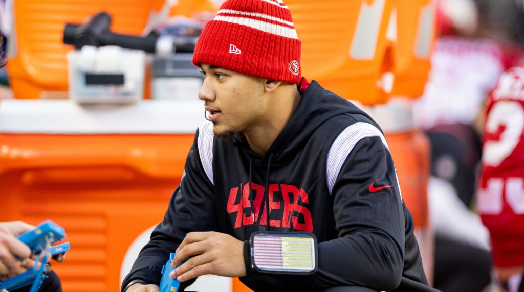 SANTA CLARA, CA - DECEMBER 04: San Francisco Quarterback Trey Lance studies on the sidelines during the NFL, American Football Herren, USA professional football game between the Miami Dolphins and San Francisco 49ers on December 4, 2022 at Levis Stadium in Santa Clara, CA. Photo by Bob Kupbens/Icon Sportswire NFL: DEC 04 Dolphins at 49ers Icon22120443