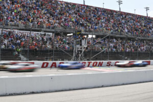 DARLINGTON, SC - MAY 14: The field races down the front stretch during the running of the NASCAR, Motorsport, USA Cup Series Goodyear 400 on May 14, 2023, at Darlington Raceway in Darlington, SC. Photo by Jeffrey Vest/Icon Sportswire AUTO: MAY 14 NASCAR Cup Series Goodyear 400 EDITORIAL USE ONLY Icon230514674