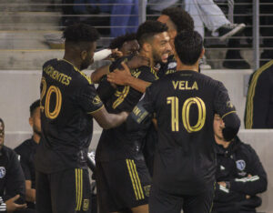 May 17, 2023, Los Angeles, California, USA: Denis Bouanga 99 of the Los Angeles Football Club is congratulated by teammates after scoring a goal during their regular season game against the Sporting Kansas City on Wednesday May 17, 2023 at the BMO Stadium in Los Angeles, California. LAFC ties with Sporting KC, 1-1. /PI Los Angeles USA - ZUMAp124 20230517_zaa_p124_061 Copyright: xJAVIERxROJASx