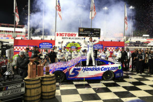 NORTH WILKESBORO, NC - MAY 21: Kyle Larson  5 Hendrick Motorsports HendrickCars.com Chevrolet celebrates after winning the NASCAR, Motorsport, USA Cup Series All-Star Race on May 21, 2023 at North Wilkesboro Speedway in North Wilkesboro, NC. Photo by Jeff Robinson/Icon Sportswire AUTO: MAY 21 NASCAR Cup Series All-Star Race EDITORIAL USE ONLY Icon2305213445