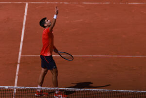 230530 -- PARIS, May 30, 2023 -- Novak Djokovic of Serbia celebrates his victory after the men s singles first round match between Novak Djokovic of Serbia and Aleksandar Kovacevic of the United States at the French Open tennis tournament at Roland Garros in Paris, France, on May 29, 2023.  SPFRANCE-PARIS-TENNIS-ROLAND GARROS-FRENCH OPEN-MEN S SINGLES GaoxJing PUBLICATIONxNOTxINxCHN