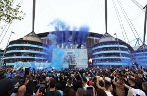 Manchester, England, 17th May 2023. Fans gather to watch the teams arrive during the UEFA Champions League match at the Etihad Stadium, Manchester. Picture credit should read: Darren Staples / SportimageManchester, England, 17th May 2023. during the UEFA Champions League match at the Etihad Stadium, Manchester. Picture credit should read: Darren Staples / Sportimage EDITORIAL USE ONLY. No use with unauthorised audio, video, data, fixture lists, club/league logos or live services. Online in-match use limited to 120 images, no video emulation. No use in betting, games or single club/league/player publications. SPI-2446-0015