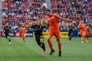 CINCINNATI, OH - MAY 20: FC Cincinnati defender Matt Miazga 21 heads the ball off while being pursued by Columbus Crew midfielder Alex Matan 20 during the Major League Soccer game between FC Cincinnati and the Columbus Crew on May 20, 2023, at TQL Stadium in Cincinnati, OH. Photo by Ben Hsu/Icon Sportswire SOCCER: MAY 20 MLS, Fussball Herren, USA - FC Cincinnati vs Columbus Crew EDITORIAL USE ONLY Icon22423052003