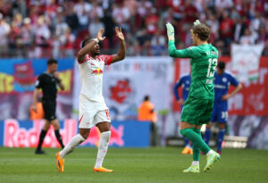 27.05.2023, Fussball 1. Bundesliga 2022/2023, 34. Spieltag, RB Leipzig - FC Schalke 04, in der Red Bull Arena Leipzig. L-R Christopher Nkunku RB Leipzig und Torwart Orjan Haskjold Nyland RB Leipzig jubeln ***DFL and DFB regulations prohibit any use of photographs as image sequences and/or quasi-video.*** *** 27 05 2023, Football 1 Bundesliga 2022 2023, 34 Matchday, RB Leipzig FC Schalke 04, at Red Bull Arena Leipzig L R Christopher Nkunku RB Leipzig and goalkeeper Orjan Haskjold Nyland RB Leipzig cheer DFL and DFB regulations prohibit any use of photographs as image sequences and or quasi video