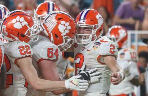 December 30, 2022: Clemson s Cade Klubnik 2 is congratulated by his teammates after scoring a touchdown during the 2022 Capital One Orange Bowl football game between the Clemson Tigers and Tennessee Volunteers at Hard Rock Stadium in Miami Gardens, FL. /CSM Miami Gardens United States of America - ZUMAc04_ 20221230_zaf_c04_265 Copyright: xKylexOkitax