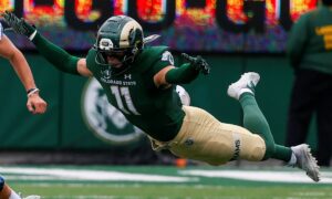 September 10, 2022: Middle Tennessee Blue Raiders quarterback Chase Cunningham 16 avoids the sack of Colorado State Rams defensive back Henry Blackburn 11 in the football game between Colorado State and Middle Tennessee at Canvas Stadium in Fort Collins, CO. MTSU rolled out to a 34-0 lead on the road and held on to win 34-19. /CSM. USA - ZUMAc04_ 20220910_zaf_c04_631 Copyright: xDerekxRegensburgerx