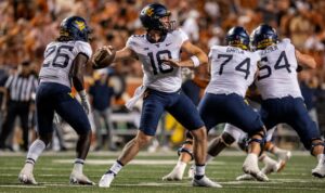 October 1, 2022. JT Daniels 18 of the West Virginia Mountaineers in action vs the Texas Longhorns at DKR-Memorial Stadium. Texas defeat the Mountaineers 38-20. Austin USA - ZUMAc04_ 20221001_zaf_c04_504 Copyright: xRobertxBackmanx
