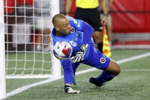 FOXBOROUGH, MA - AUGUST 03: New England Revolution goalkeeper Earl Edwards Jr. 36 dives for a penalty shot during a League Cup match between the New England Revolution and Atlas Futbol Club on August 3, 2023, at Gillette Stadium in Foxborough, Massachusetts. Photo by Fred Kfoury III/Icon Sportswire SOCCER: AUG 03 Leagues Cup - Atlas FC vs New England Revolution EDITORIAL USE ONLY Icon482230803048