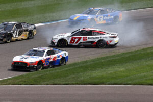 INDIANAPOLIS, IN - AUGUST 13: NASCAR, Motorsport, USA driver Kamul Kobayahi 67 spins out in turn 2 during the NASCAR Cup Series Verizon 200 at the Brickyard on August 13, 2023, at the Indianapolis Motor Speedway Road Course in Indianapolis, Indiana. Photo by Brian Spurlock/Icon Sportswire AUTO: AUG 13 NASCAR Cup Series Verizon 200 at the Brickyard EDITORIAL USE ONLY Icon230813067
