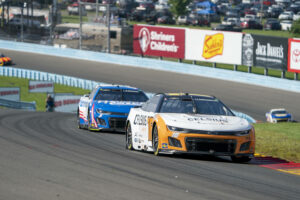 August 20, 2023, Watkins Glen, NY, USA: August 20, 2023 - Watkins Glen, NY: NASCAR, Motorsport, USA Cup Driver, AJ Allmendinger 16 races for position for the Go Bowling at the Glen at the Watkins Glen International in Watkins Glen NY. Watkins Glen USA - ZUMAa161 20230820_aaa_a161_036 Copyright: xLoganxTxArcexGrindstonexMediaxGrx