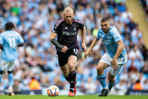 Manchester City v Fulham Premier League 02/09/2023. Fulham defender Tim Ream 13 runs forward during the Premier League match between Manchester City and Fulham at the Etihad Stadium, Manchester, England on 2 September 2023. Manchester Etihad Stadium Manchester England Editorial use only DataCo restrictions apply See www.football-dataco.com , Copyright: xManjitxNarotrax PSI-17946-0114