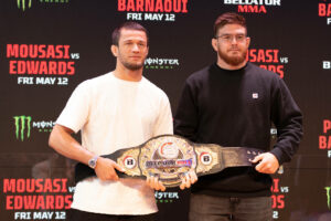 May 9, 2023, Paris, France: Paris, France - May 9: L-R Usman Nurmagomedov and Johnny Eblen pose with the belt during the Bellator 296 press conference, PK, Pressekonferenz event inside Gustave Eiffel Lounge on May 9, 2023 in Paris, France Paris France - ZUMAp175 20230509_zsa_p175_011 Copyright: xJosexPrestesx
